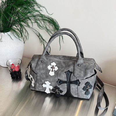 cross embedded bag