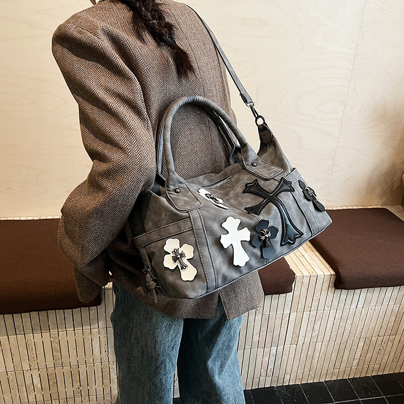cross embedded bag